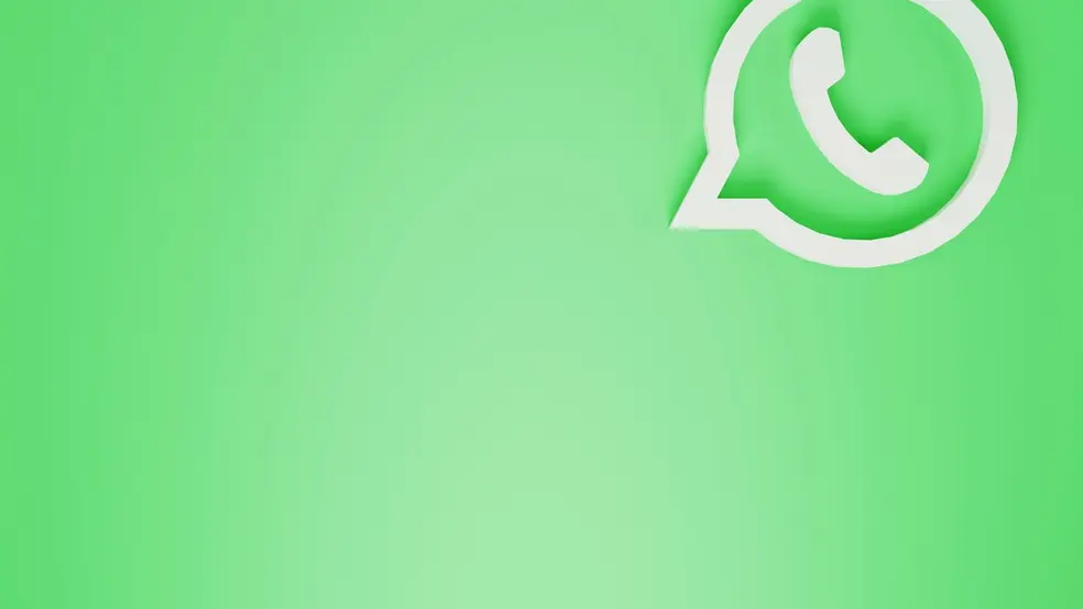 Logo aplikace WhatsApp na světlém zeleném pozadí.